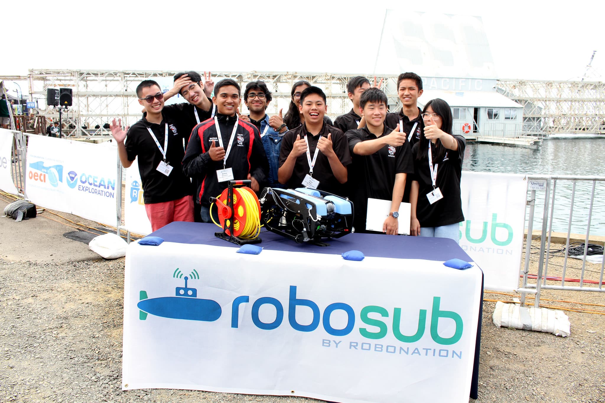 Casual team photo at RoboSub table