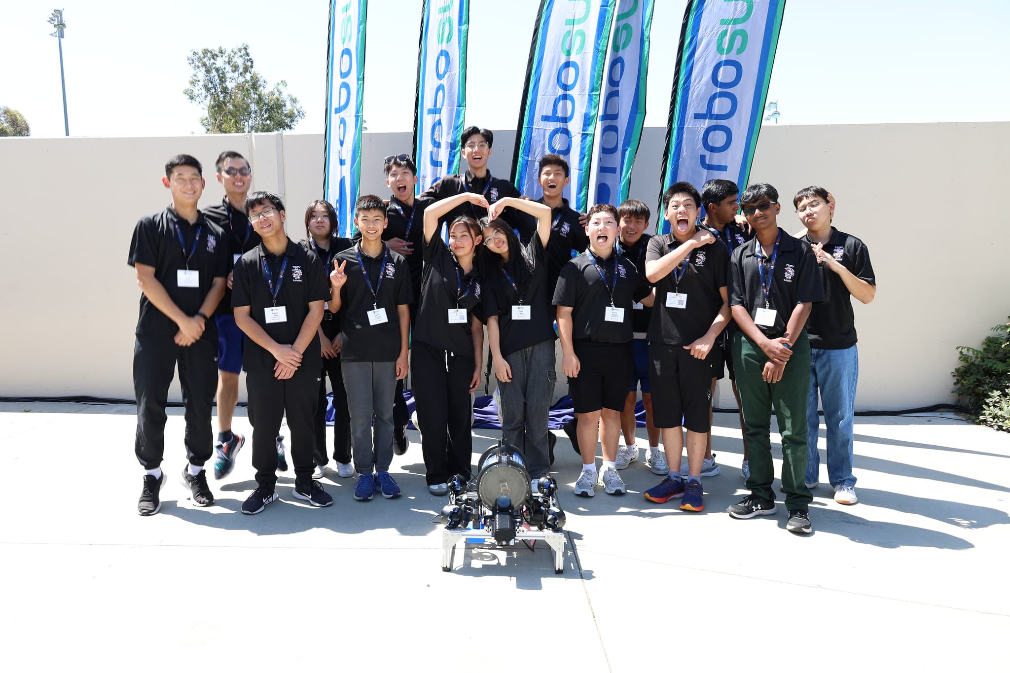 Fun team group photo at RoboSub banners